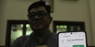 Super Apps Muktamar Muhammadiyah Resmi Diluncurkan, Dapat Dunduh di Play Store Wakil Sekretaris Panitia Pusat Muktamar ke 48 Muhammadiyah dan Aisyiyah, Iwan Setiawan menunjukan aplikasi Super Apps Muktamar Muhammadiyah yang dapat di unduh di Play Store.
